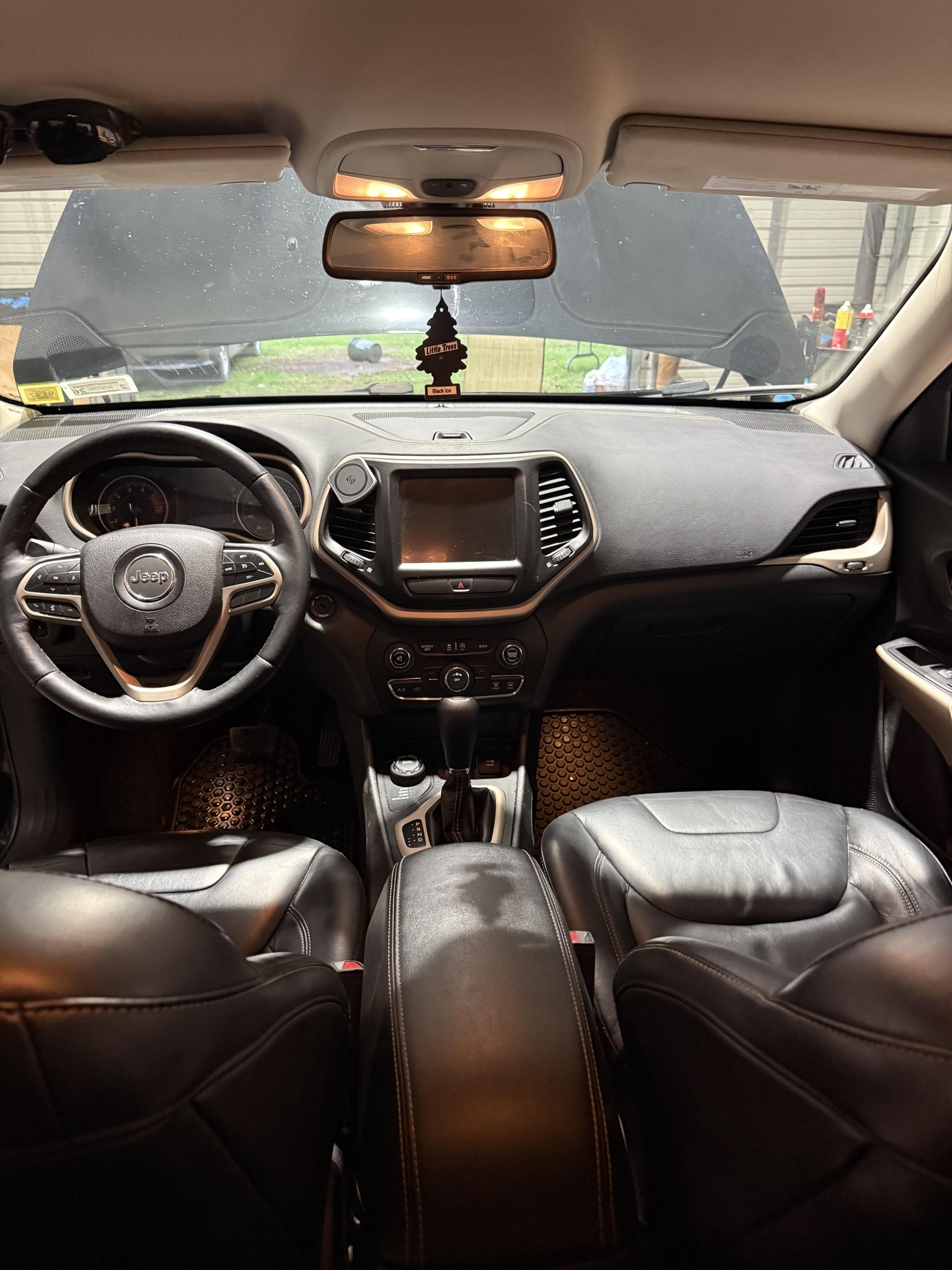 Freshly detailed car dashboard — after C&C Shine treatment